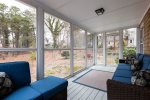 Screened porch with outdoor furniture - relax with a book or enjoy an afternoon cocktail